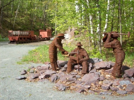 Iron Ore Trail in Negaunee sites with steel workers