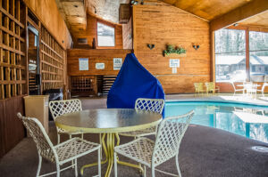 Visit the Cedar Motor Inn and enjoy their gorgeous pull deck with lounge chairs and a hot tub