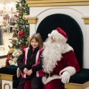 This little girl was very pleased to see Santa.