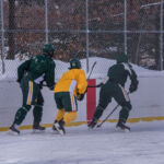 Some strong defense from the Green team, stealing the puck away.